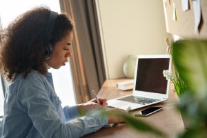 girl using home computer